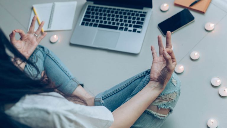 student,business people sitting in room with candle do meditatio