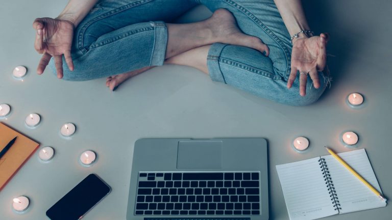student,business people sitting in room with candle do meditatio